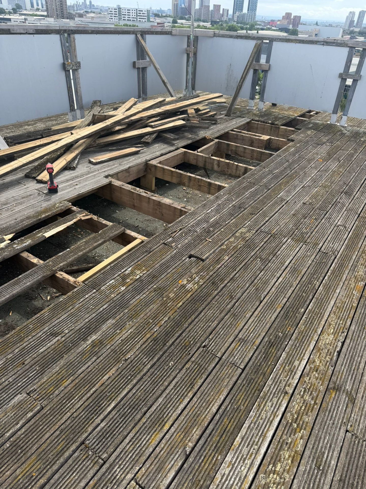 Roof decking stripped in progress during a building maintenance job